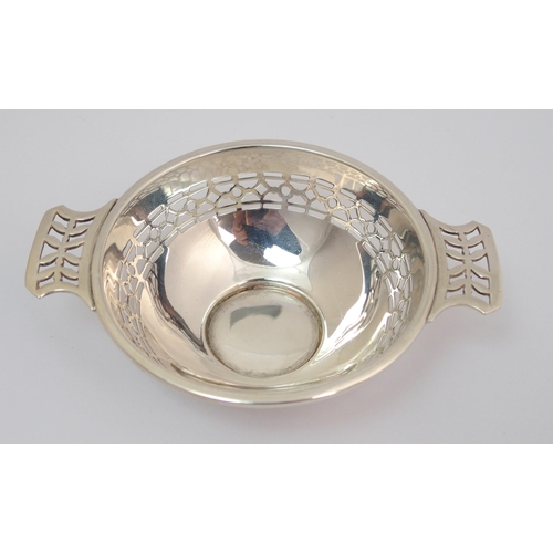 169 - A silver quaich with pierced handles