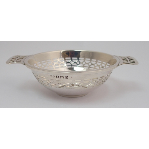 169 - A silver quaich with pierced handles