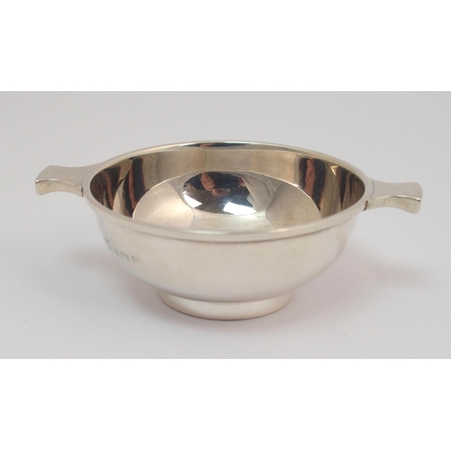 169 - A silver quaich with pierced handles