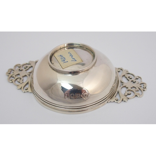 169 - A silver quaich with pierced handles