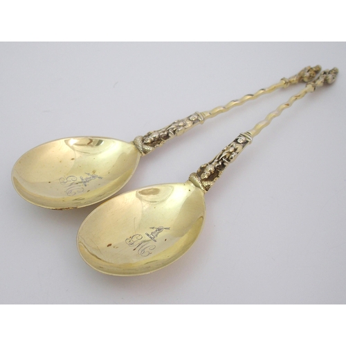 170 - A pair of cased silver-gilt apostle spoons