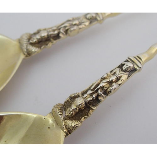 170 - A pair of cased silver-gilt apostle spoons