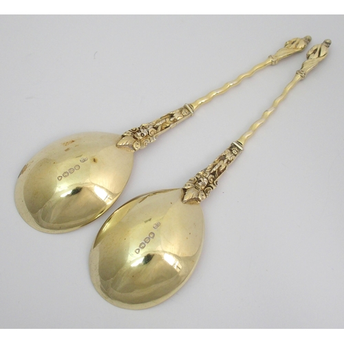 170 - A pair of cased silver-gilt apostle spoons