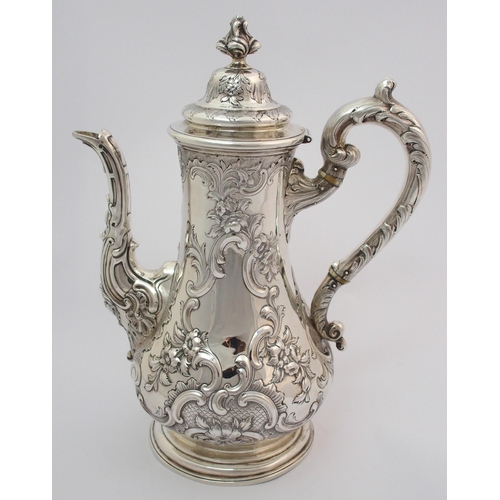 172 - A Victorian silver coffee pot