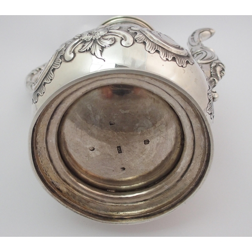 172 - A Victorian silver coffee pot