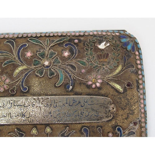 175 - A Middle-Eastern white-metal and enamel cigarette case