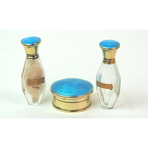 176 - A cased silver and enamel pair of scent bottles with matching pill box