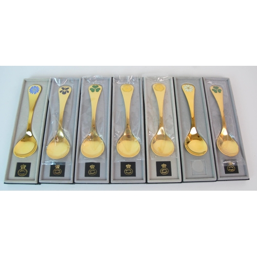 177 - Thirteen Georg Jensen silver gilt and enamel year spoons  1976-1981