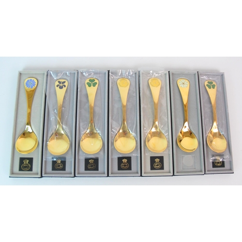 177 - Thirteen Georg Jensen silver gilt and enamel year spoons  1976-1981