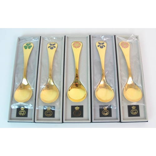 177 - Thirteen Georg Jensen silver gilt and enamel year spoons  1976-1981