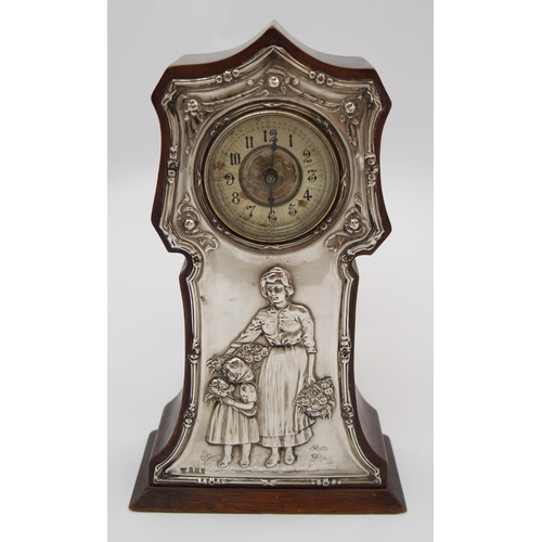 179 - An Art Nouveau silver-mounted mahogany mantle clock