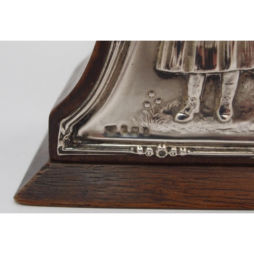 179 - An Art Nouveau silver-mounted mahogany mantle clock