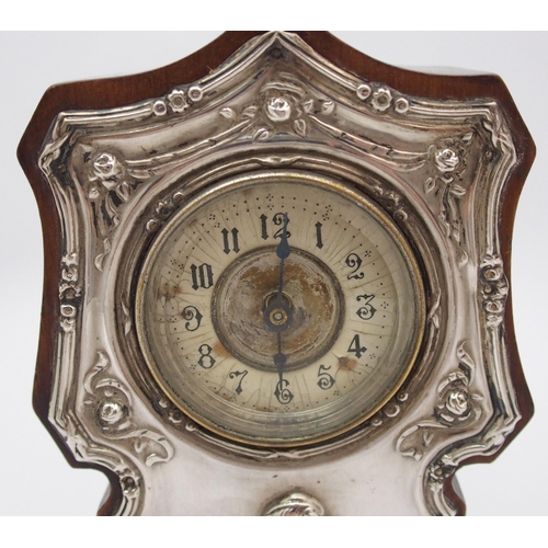 179 - An Art Nouveau silver-mounted mahogany mantle clock