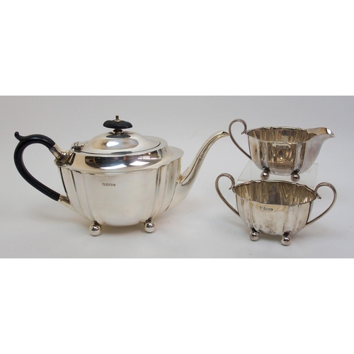 181 - A silver three piece tea set