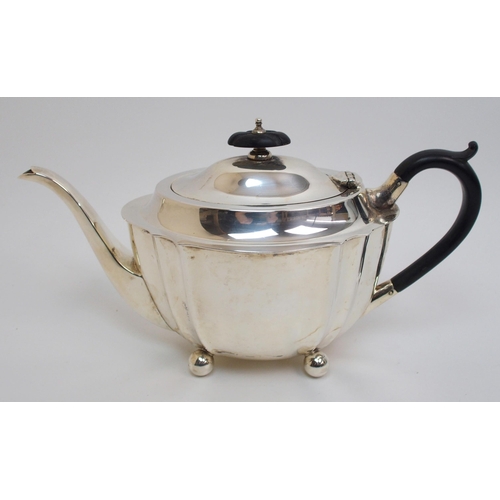 181 - A silver three piece tea set