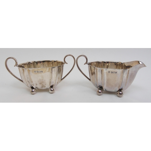 181 - A silver three piece tea set