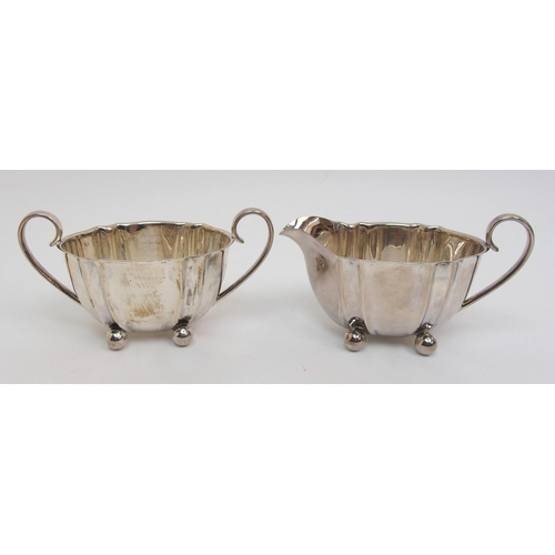 181 - A silver three piece tea set