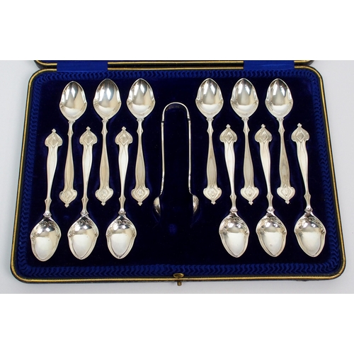 195 - A set of twelve Art Nouveau silver coffee spoons and tongs