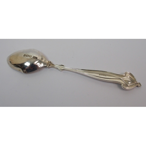 195 - A set of twelve Art Nouveau silver coffee spoons and tongs