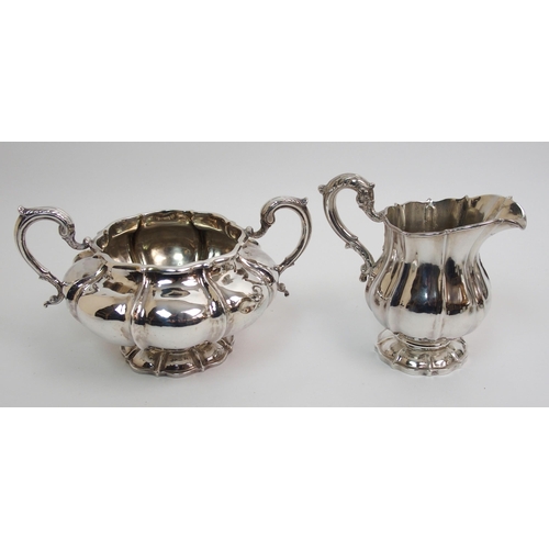 200 - A William IV three piece silver tea service