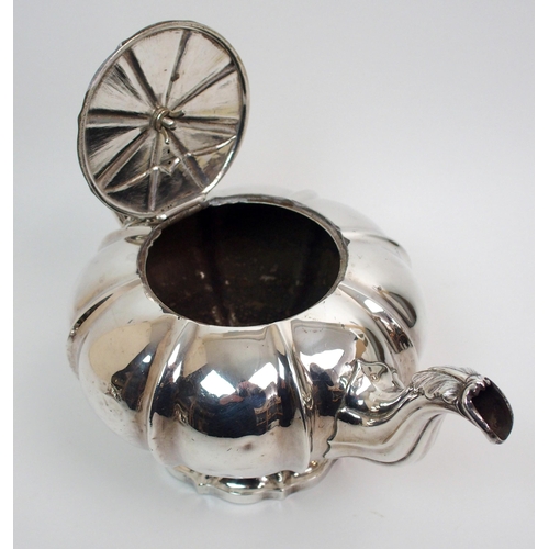 200 - A William IV three piece silver tea service