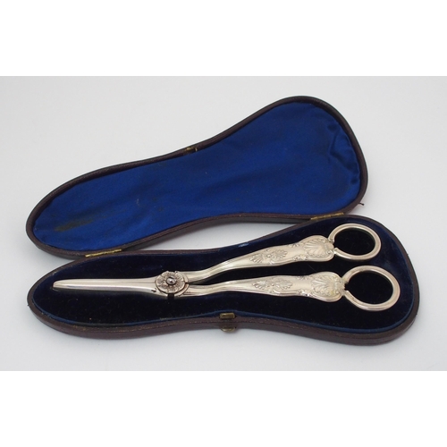 205 - A pair of cased silver grape scissors