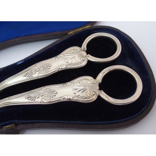 205 - A pair of cased silver grape scissors