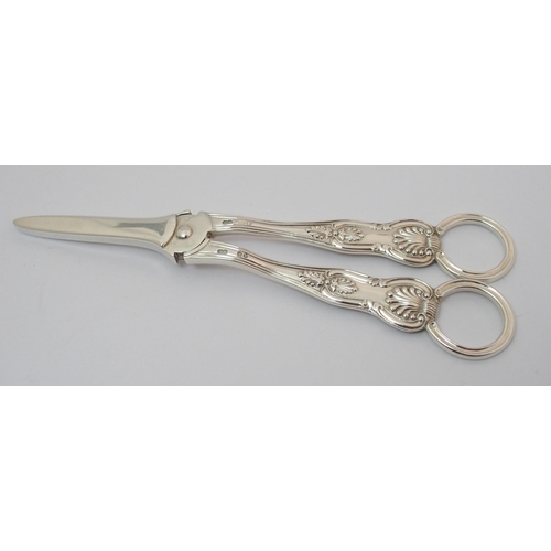 205 - A pair of cased silver grape scissors