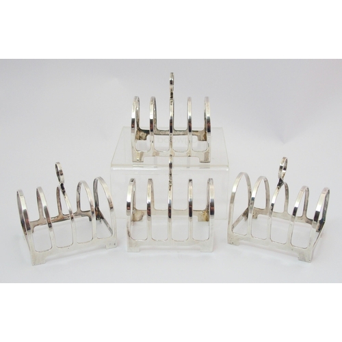 206 - A set of four silver toastracks