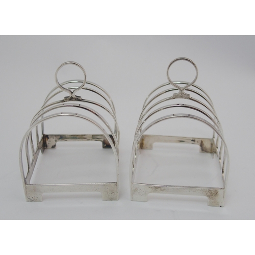 206 - A set of four silver toastracks