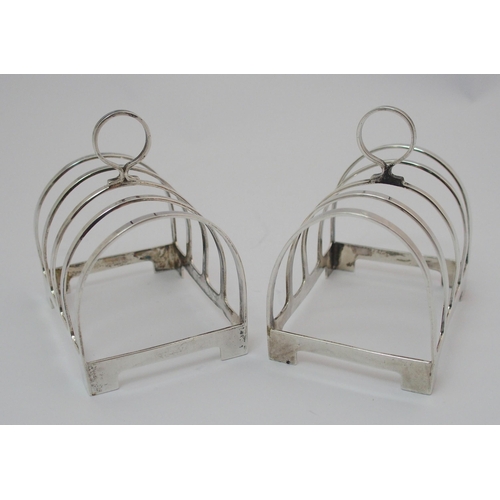 206 - A set of four silver toastracks