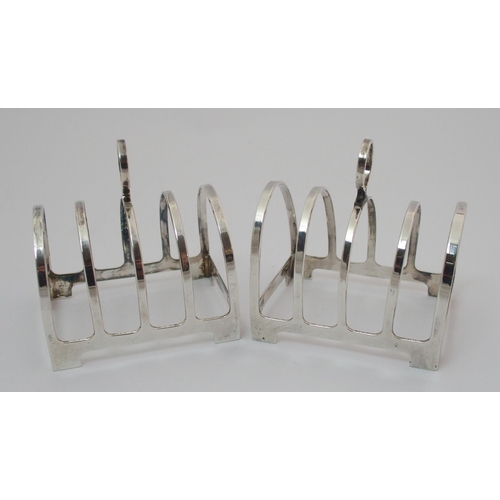 206 - A set of four silver toastracks