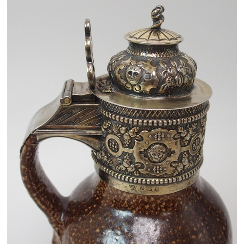 214 - An Elizabeth I style Tigerware jug