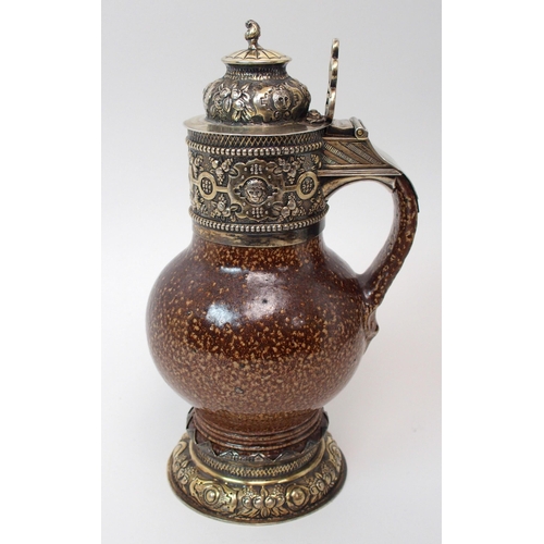 214 - An Elizabeth I style Tigerware jug