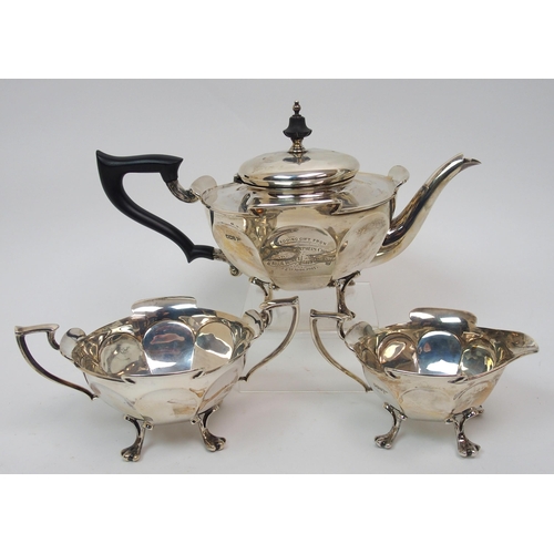 217 - A three piece silver tea service