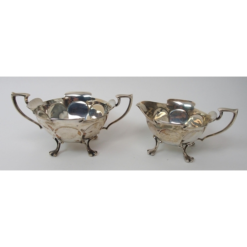 217 - A three piece silver tea service