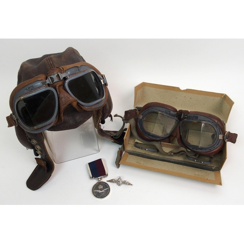 231 - An Airman's leather flight cap with attached goggles