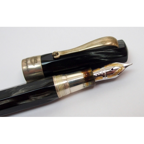 254 - A Montegrappa 1912 silver-mounted fountain pen  with black marble effect body in original box