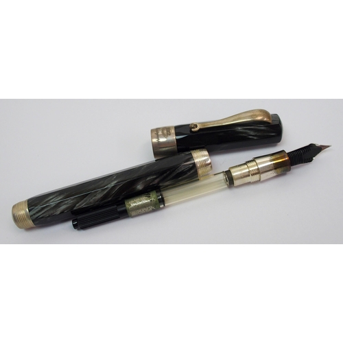 254 - A Montegrappa 1912 silver-mounted fountain pen  with black marble effect body in original box