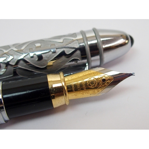 254 - A Montegrappa 1912 silver-mounted fountain pen  with black marble effect body in original box