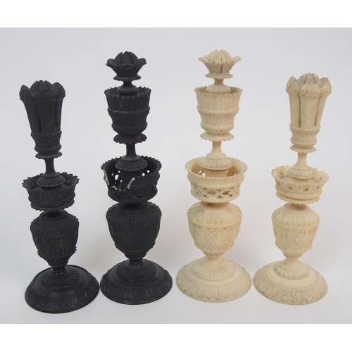 257 - An early carved chess set