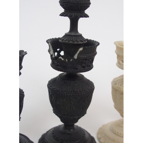 257 - An early carved chess set