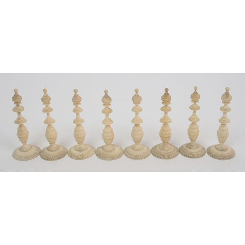 257 - An early carved chess set