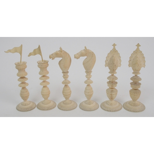 257 - An early carved chess set