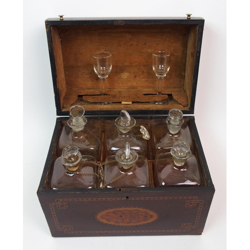 264 - A Georgian cased set of plain decanters