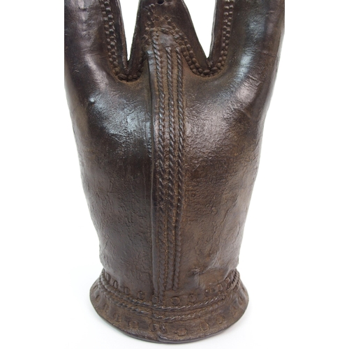 265 - A possibly Middle Eastern leather water jack