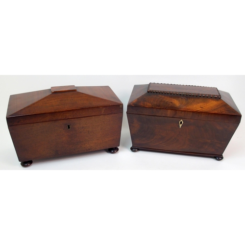 266 - A Victorian mahogany sarcophagus-shaped two division tea caddy