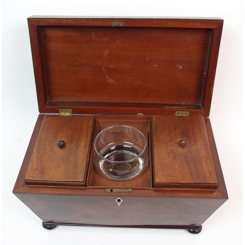 266 - A Victorian mahogany sarcophagus-shaped two division tea caddy