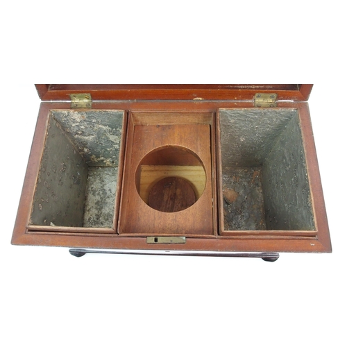 266 - A Victorian mahogany sarcophagus-shaped two division tea caddy