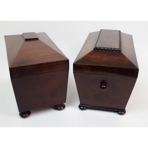 266 - A Victorian mahogany sarcophagus-shaped two division tea caddy